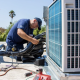A Pros 360 professional troubleshoots an air conditioning unit to ensure their air conditioning investment lasts for years.